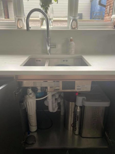 Undermount double kitchen sink with the Quooker boiling water tank fitted below